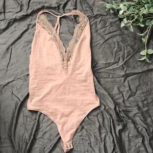 3/$15 or 2/$10 Express bodysuit
